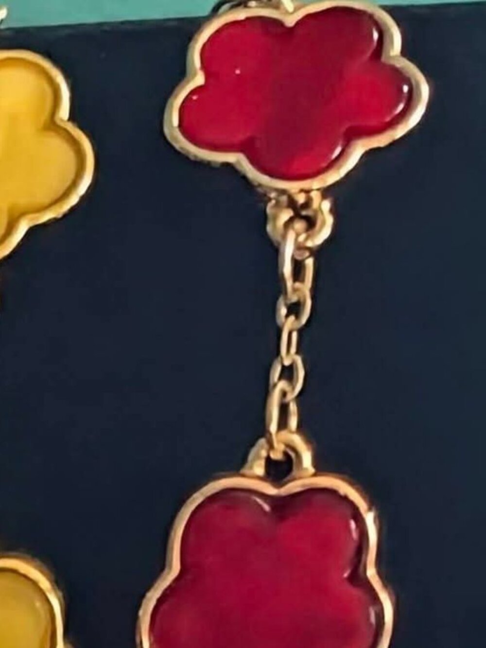Gold over stainless steel red clover bracelet